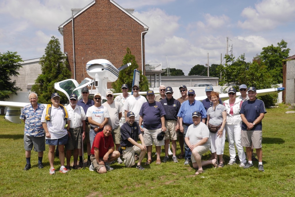 Local Seaplane Pilots pose for a photo nearly in the same spot as a photo taken nearly 100 years earlier